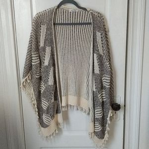 Anthropologie - Open knit wrap with tassels